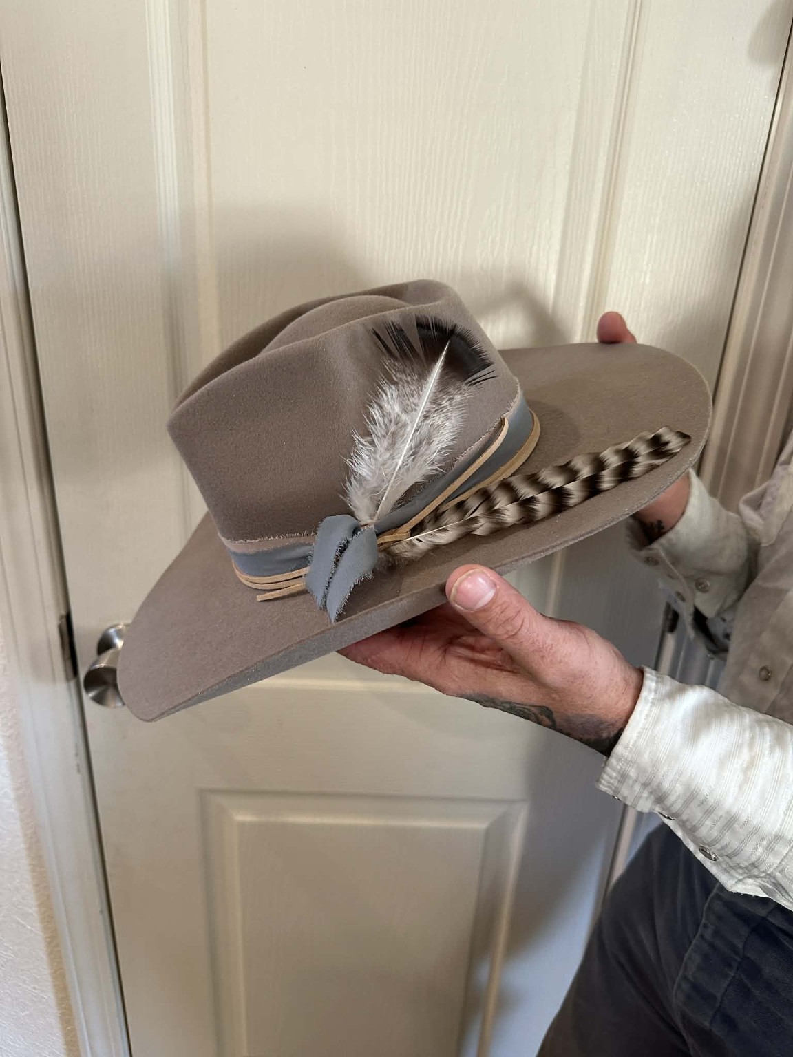 Custom felt hat with feathers